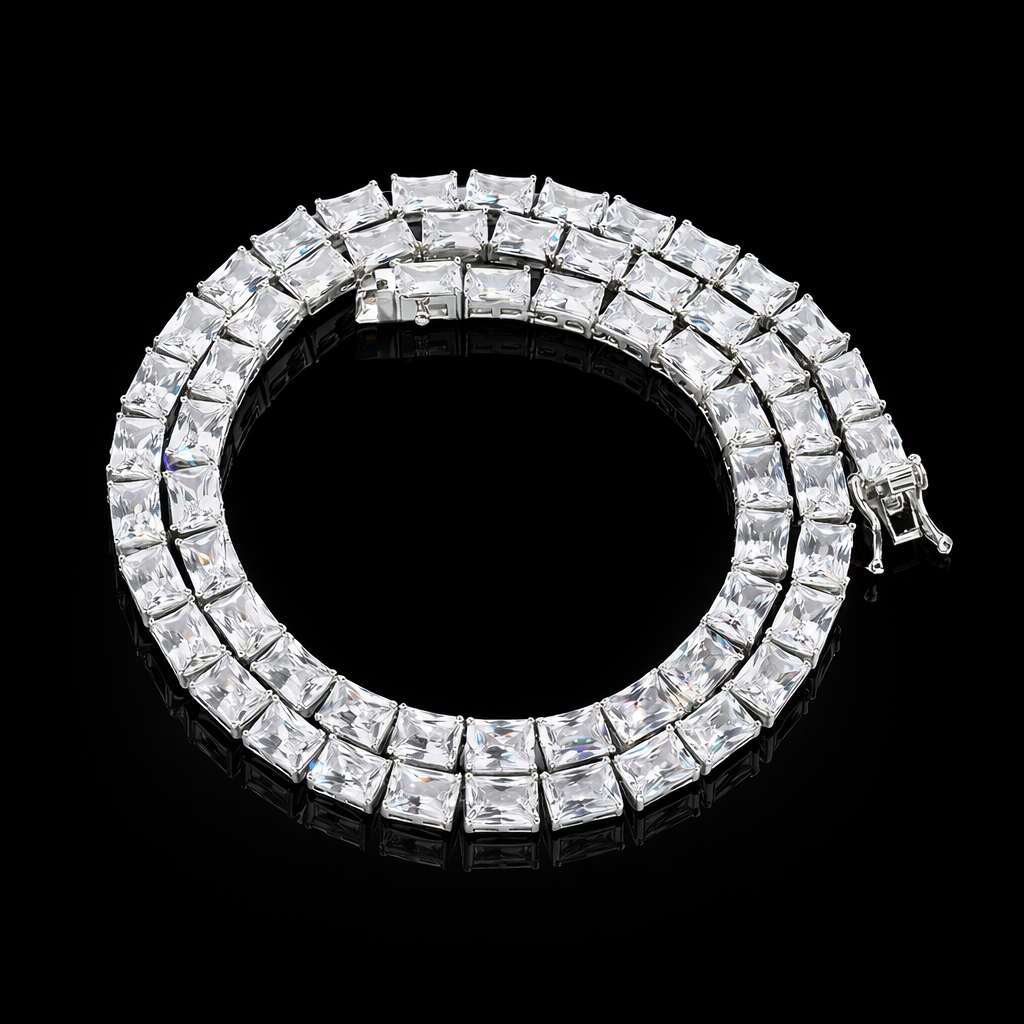 Luxury emerald cut white gold tennis chain featuring elongated square stones
